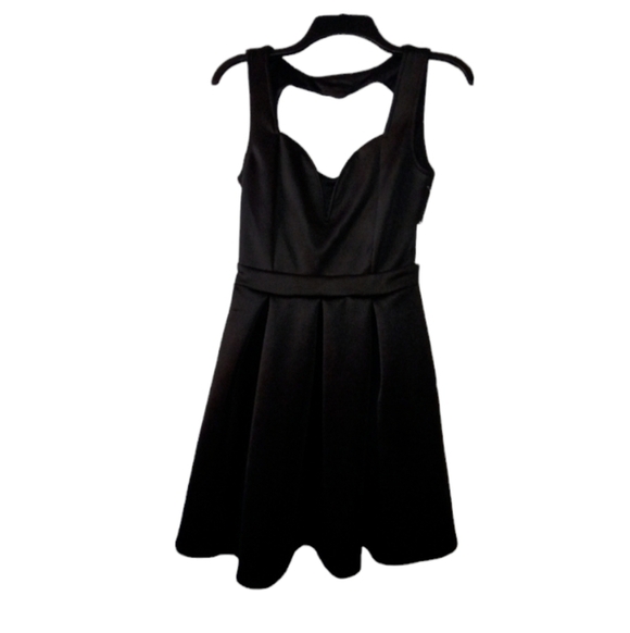 Charlotte Russe Dresses & Skirts - Charlotte Russe black heart cut out skater dress
